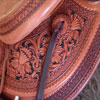 Half tooled Vaquero Lace with Daffodil flower Wade Saddle
built on a 94 degree bar that fits a well built muscular shoulders -
The seat is finished at 15 & 1/2 inch with a close contact deep pocket fit -
Gullet is 7 & 1/2 inch height by 6 & 1/2 width with the back hand hole width at 4 inch -
Horn is 6 inch height by 5 and 1/2 inch width Guadalajara at 31 degree pitch - Cantle is 4 and 1/2 inch in height by 12 & 1/2 in width with a Cheyenne roll - Flat plate riggin at 7/8ths
- leather lined 5 inch Stainless Steel Moran Stirrups .